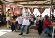 A bustling cafe in the vibrant East Nashville community.