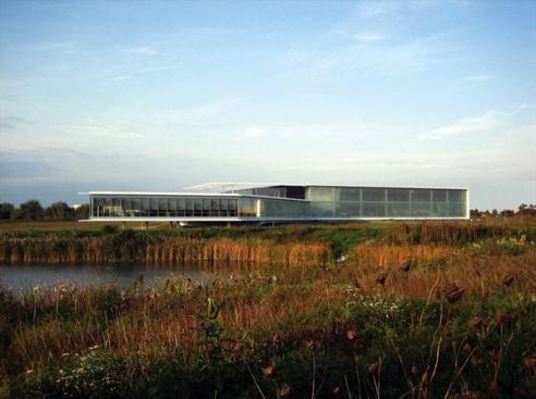 The Serta International Center seems to float above the wetlands in its suburban Chicago site.