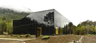 The highly reflective exterior cladding allows the building to showcase its surroundings.