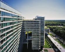 This monolithic, 650-unit condominium complex is broken up by cantilevered balconies and enlivened by green roofs at several levels, the largest of which is 1.2 acres