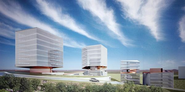 To break up the monumentality of four glass-encased commercial towers in this rugged landscape, the architects create a horizontal view line that echoes the incline of the hill and cuts through all four towers. Ramps connect some of the buildings and continue inside, creating a torqued circulation sequence and staggered floor plates.