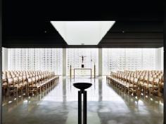 The Chapel of St. Ignatius of Loyola at Christ the King Jesuit College Preparatory School in Chicago is illuminated by the natural light that filters through three walls of varying-sized glass block.