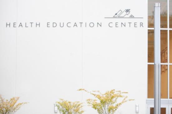 Light Column Pedestrian Lighting shown with 180 degree perforated shield at Pierce College Fort Steilacoom, Lakewood, Washington