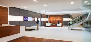 The welcoming lobby draws visitors into the heart of the office and to the Design Center beyond