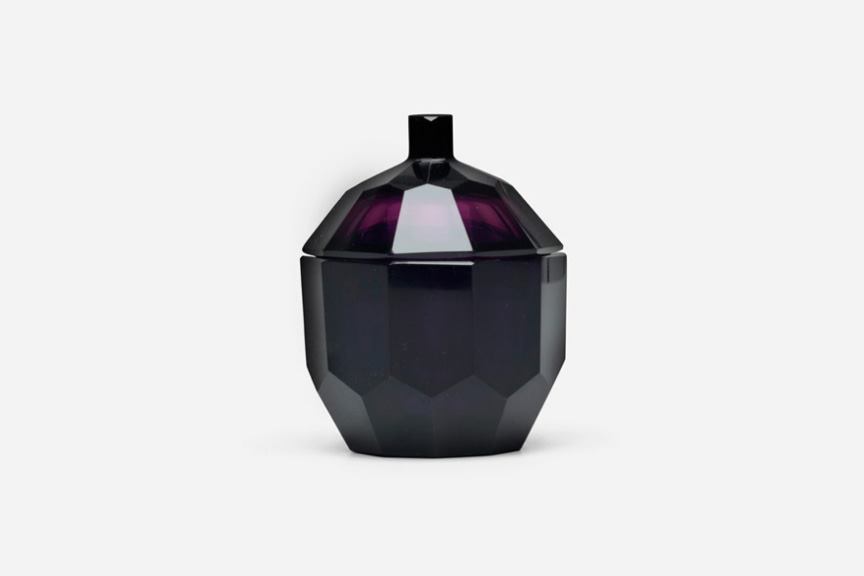 An amethyst glass lidded vessel designed by Joseph Hoffmann, manufactured in Austria, circa 1923, by Moser Karlsbad for the Wiener Werkstatte. Measurements: 4.5 in. wide, by 4.25 in. deep, by 5.5 in. high.