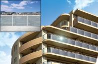 A rendering depicting Sharp's new light-transmitting solar panels used as guardrails.