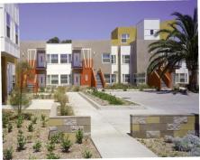 An attractive but anonymous freeway facade gives no hint of Tesoro Grove's lively interior, patterned with pedestrian courtyards, trellises, and thoughtful landscaping.