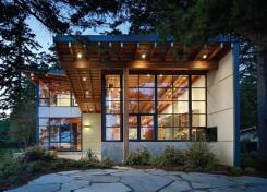 The architects continued the homes textured ceiling outside to form an exterior soffit.