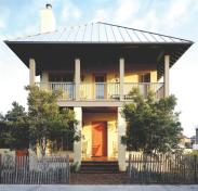 The home's stately facade gives way to an exuberant interior, filled with bright colors and surprising materials.