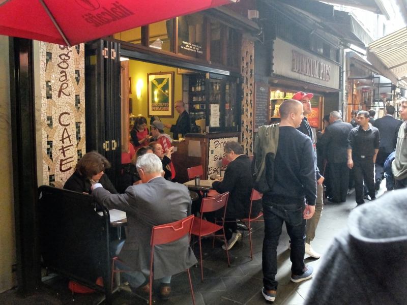 A populated laneway in Melbourne: urban space becomes architectural.
