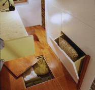 This lean apartment renovation fits two sleeping areas and plenty of storage into its diminutive 510 square feet.