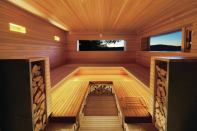 The sauna's interior is lined with cedar slats.