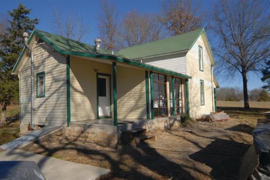 The new bath revives the spirit of an original porch that had been walled in since the arrival of indoor plumbing.