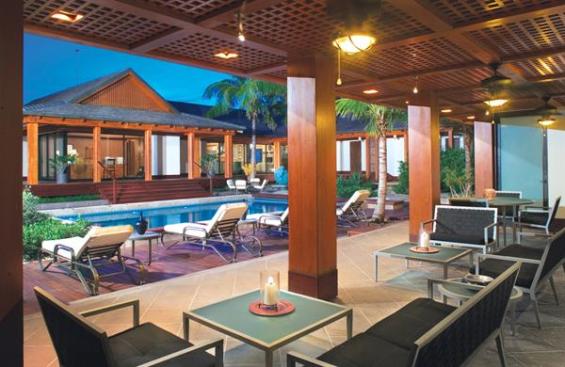 The carpenters cut each 2 by 2 inch piece of latticework on a CNC machine for accuracy. A sealer applied to all the exterior wood three times a year keeps salt and moisture at bay.