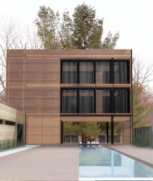 Iowa's rural corncribs inspired this simple glass box shaded with wood slats. A long gallery connects the guesthouse to the main house and echoes its linear circulation spine.