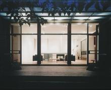 Steel-framed windows and doors at the back of the studio face west and afford access to an unusually wide garden.