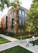 The buildings' colored bays animate the street.