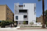 749 Cloverdale's layered facade conceals balconies that serve as exterior circulation for the complex.