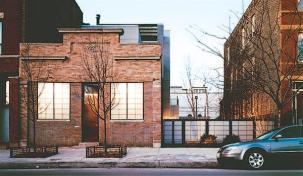 The architects set the new second and third floors back from the street elevation.