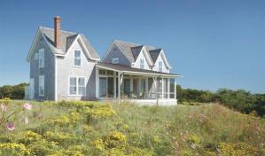 The porch forms the spine of the house, opening into a lightfilled living room and continuing through to the other side.