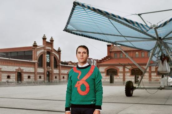 Andrés Jaque poses in front of his firm's “Escaravox” project. Jaque purchased a series of winged rolling irrigation platforms, added speakers, wiring and lighting, and staged them in a public square in Madrid. Musicians, DJs, writers, and actors used them to plug in equipment and hold impromptu readings and performances.