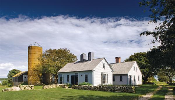 One of the two chimneys in the addition is a skylight that illuminates a bath.