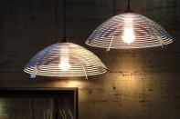 Steplight from Graypants, a Seattle lighting design studio founded in 2008 to “create products, architecture, and other fun things around the world,” is made from 16 interlocking recycled aluminum rings. The disparate rings cast concentric shadows onto nearby walls and ceilings. The 16”-diameter light ships flat with assembly instructions that do not require tools, adhesives, or fasteners. graypants.com