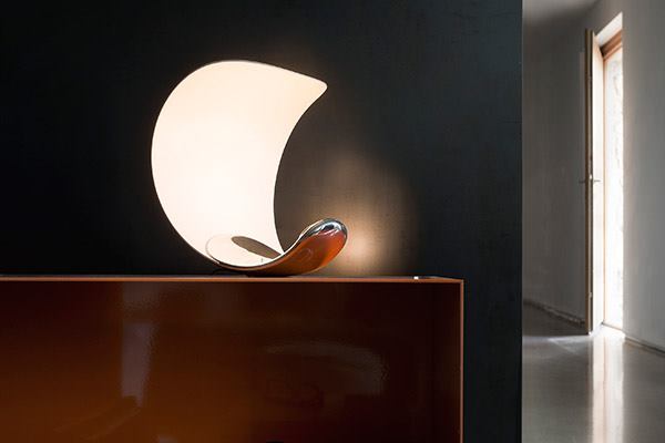 Curl from Luceplan doesn’t play it straight. The die-cast aluminum luminaire by London-based Sebastian Bergne has no designated base, allowing it to stand in a variety of positions, including on its side. With a proprietary LED module that changes the color temperature of its ambient white light from 2400K to 3500K, the fixture measures 10" tall by 8" wide and 9" deep, when oriented upright like a crescent moon. luceplan.com