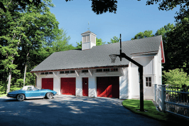 Remodeler Halsey Platt and his crew extended the eaves on the carriage house to keep water away from the siding. They also protected the lower section of the building by using Azek (azek.com) trim, a 1-inch by 3-inch cap, and white aluminum flashing that goes over the cap and up the side of the building. The carriage house has new vertical cedar siding installed over Benjamin Obdyke’s (benjaminobdyke.com) Cedar Breather underlayment, which remodeler Halsey Platt describes as a “plastic Brillo Pad-like” material that allows the wood to breathe.