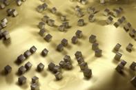 A depiction of gold film covered with light-cancelling silver nano cubes.