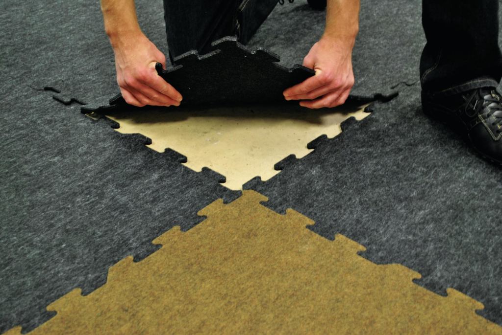 Ecore's Eco98 features a wear layer made entirely with recycled plastic bottles and a rubber backing that contains up to 98 percent recycled content.