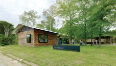 Designed and built by Rural Studio students in Newbern, Ala., the town hall is built out of stacked timbers. Sourced locally, the cypress beams were squared at 8 inches by 8 inches and are held together with a ½-inch threaded rod.