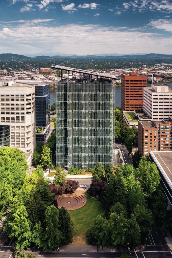 The Edith Green–Wendell Wyatt Federal Building is capped by a slanted roof clad in photovoltaics from Solar World. The angle was determined by solar studies to maximize the efficiency of the array.
