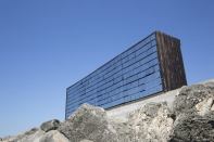 French firm NAS Architecture designed Breath Box's mirrored façade to respond to changes in the local environment.