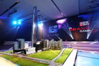 This photo released by Grand Canal Land Public Company Ltd. shows a scale model of a skyscraper that a property developer plans to build in Bangkok that will be among the 10 tallest buildings in the world when completed in 2019. The 125-floor tower will rise 615 meters (2,018 feet) and include a luxury hotel, offices, and an observation deck with panoramic views of the Thai capital, the developer said in a statement.