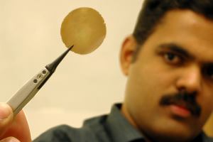Rahul Nair, who is researching a novel graphene-oxide coating at the University of Manchester, in the U.K., displays a one-micron-thick graphene-oxide membrane.