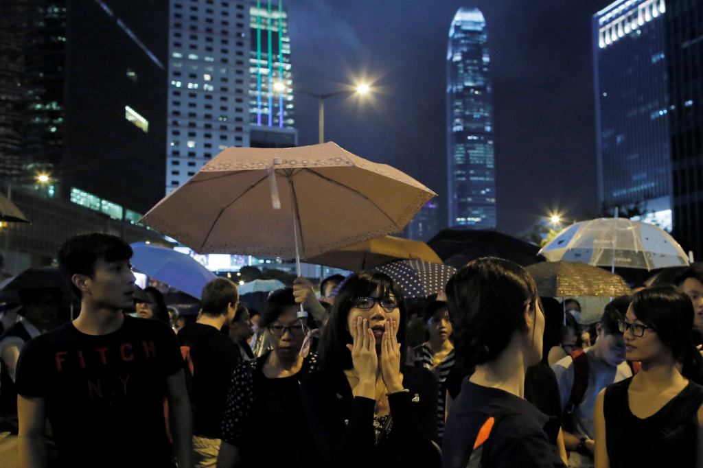Protester reacts during a rally outside government headquarters in Hong Kong.