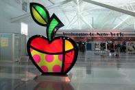 Big Apple, a sculpture by Romero Britto, greets visitors to JFK International Airport in New York.