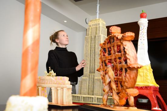 The world's first exhibition of edible architecture opened yesterday at The Proud Archivist galleries in London. Highlights of the "Pastry Paradise" exhibit include the Trifle Tower, the London Pie, and the Battenberg Gate. The exhibition will culminate in the consumption of the artworks on display by the viewing public after the exhibit closes on Friday, Dec. 12.