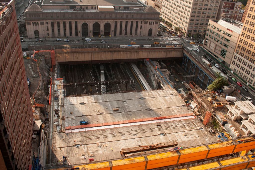 The under-construction platform for the Manhattan West mixed-use development project at Ninth Avenue and 33rd Street in New York. The platform is being constructed over existing an Amtrak rail yard. Skidmore, Owings & Merrill is the master plan architect for the Manhattan West project, and James Corner Field Operations is the landscape architect.
