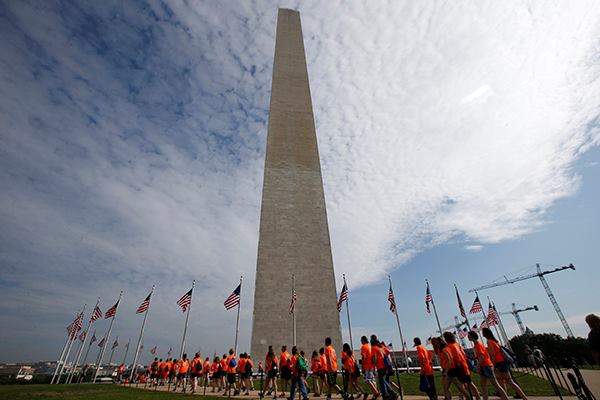 Students in front of the Washington Monument on May 12. (AP Photo)