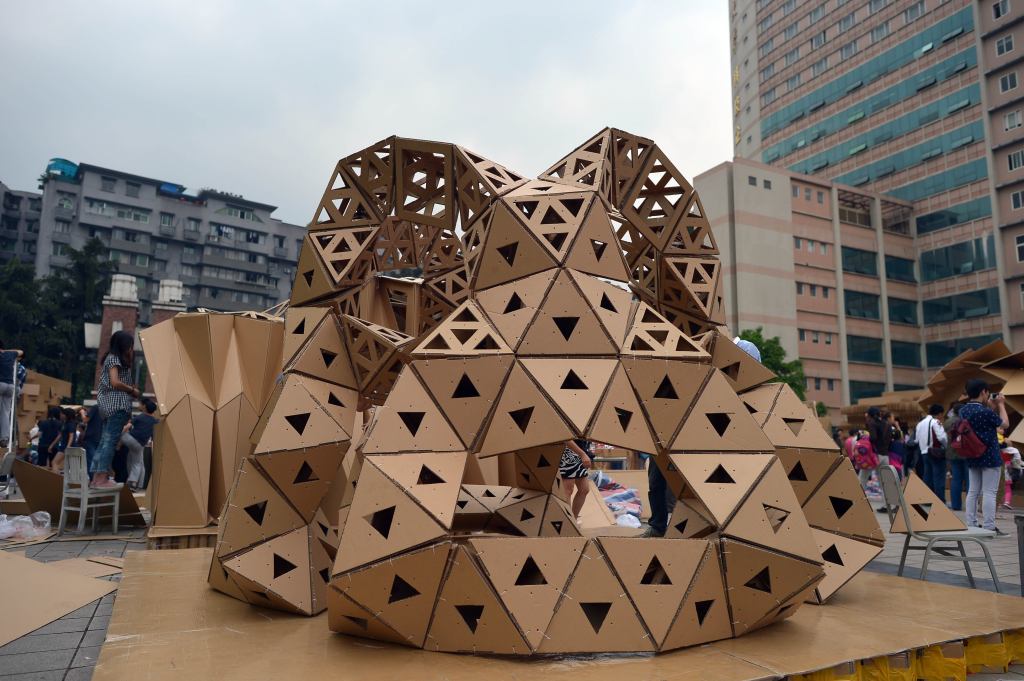 A paper house built by Chinese students is displayed at the campus of Chongqing University in Chongqing, China. More than 350 students from 19 teams built paper houses at Chongqing University. The university's architecture and urban planning department and five high schools in Chongqing jointly held the activity to inspire students' creativity.