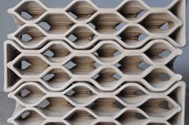 DesignLabWorkshop developed each brick geometry by first scripting a wall and then subdividing that wall in Grasshopper into modules, which became the bricks. When the wall profile changes, the shape of the individual bricks automatically updates.