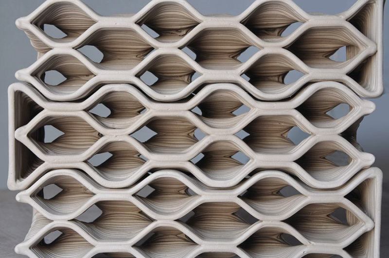DesignLabWorkshop developed each brick geometry by first scripting a wall and then subdividing that wall in Grasshopper into modules, which became the bricks. When the wall profile changes, the shape of the individual bricks automatically updates.