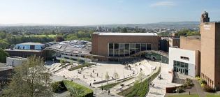 The Forum’s freeflowing gridshell mirrors 
the rolling hills around the University of Exeter. The designers used 
European oak to create the effect of a wooded canopy and capped the roof
 in copper, which will oxidize, form a green patina over time, and allow
 the building to age in harmony with its surroundings.