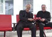 Curt Fentress (left), CEO and design principal at Denver-based Fentress Architects, teamed up with industrial designer Michael McCoy on a feature-packed airport seating system designed to meet the needs of today's travelers.