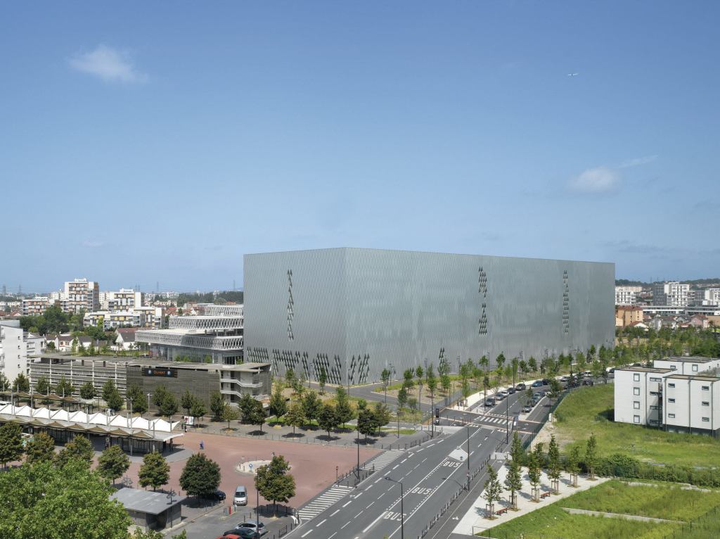 In the storage volume, vertical strips of fenestration mark voids between the stacks.
