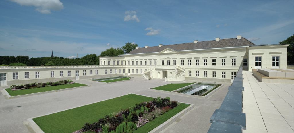 In the courtyard, parterres have been removed to accommodate light wells for the conference level below.