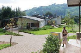 To adapt an existing building on the campus into the new ambulatory cancer center, MASS Design Group turned to hand-sawed formwork for concrete mixed on site, and used CMUs formed on site to replace much of the original structure.