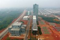 Zhang Yue, a developer who is using a prefab system to build the world’s tallest tower, Sky City, in Changsha, China, has constructed a test slice (lower left) of stories 165 to 173.